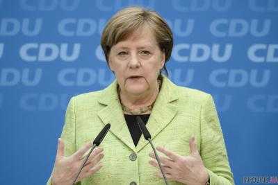 А.Меркель назвала победу Э.Макрона на выборах во Франции "эффектной"