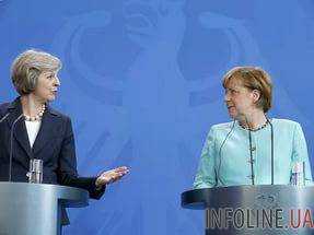 Т.Мэй заверила Меркель в скором старте переговоров по Brexit