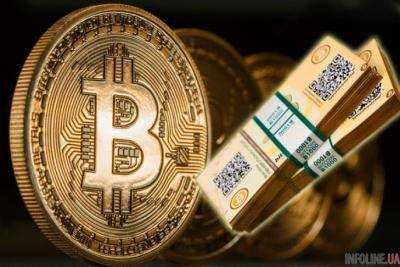 Курс криптовалюты Bitcoin поднялся почти до 11 тыс. долл.