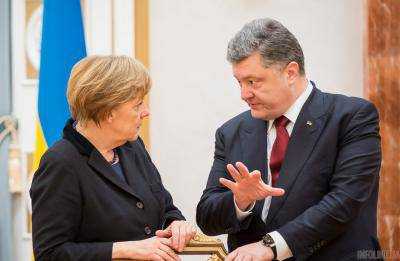 Порошенко обсудил с Меркель и Макроном вопрос украинских заложников