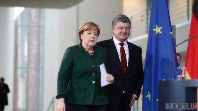 Порошенко переговорил с Меркель накануне ее встречи с Путиным