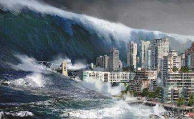 Известный курорт под водой: гигантское цунами крушит здания и машины, отрывают балконы. Шокирующее видео стихии