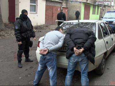 Арестовали членов вооруженной банды, которая грабила валютчиков