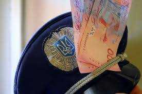 Должностное лицо горотдела милиции во Львовской области задержали при получении взятки