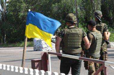 В течении суток российские военные и боевики около 20 раз обстреляли позиции сил АТО - СНБО