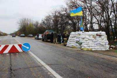 На блокпосту в Запорожской области милиция задержала автомобиль с оружием и боеприпасами