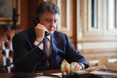 Порошенко с Меркель по телефону обсудили пути мирного урегулирования ситуации на Донбассе