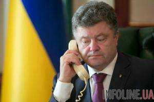 П.Порошенко - А.Меркель: боевики не соблюдают режим прекращения огня