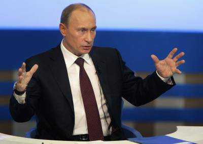 Президент России В.Путин призвал запустить работу национальной системы платежных карт