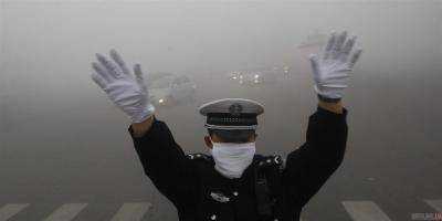 Власти Пекина отменили "красный" уровень опасности, введенный из-за смога