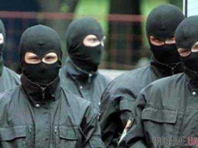В Киевской области сообщили о подозрении 12 мужчинам за совершение разбойного нападения