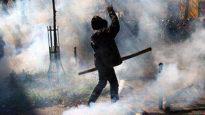 Во Франции полиции пришлось применить против беженцев слезоточивый газ
