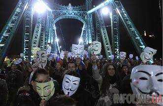В ходе проведения в Лондоне "Марша миллиона масок" полиция задержала более 50 человек