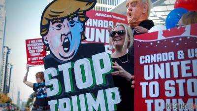 В Вашингтоне десятки тысяч вышли на "Марш женщин" против Д.Трампа