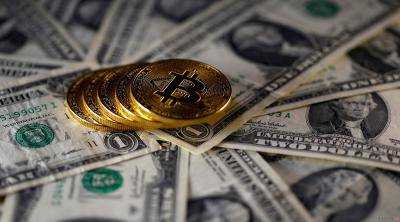 Криптовалюты растут: биткоин держится ниже 10 тысяч долларов