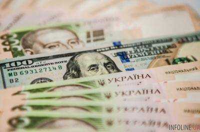 На 20 января официальный курс гривны установлен на уровне 28,03 грн/доллар